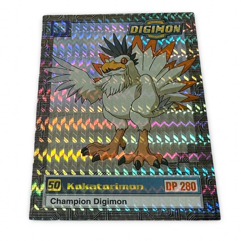 1999 Upper Deck Digimon Series 2 Kokatorimon 34 of 34 Prism Holofoil Card